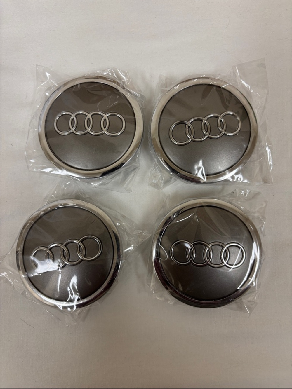 Audi Wheel Center Caps Set - Metallic Gray with Chrome Rings (4pcs)